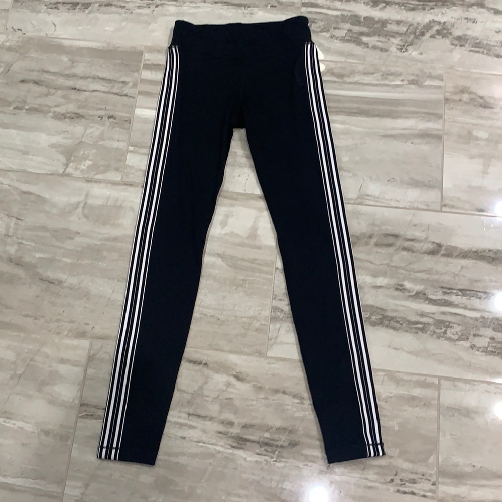 Athleta Girl Earn your stripe leggings in black and white. Size Large (10-12).